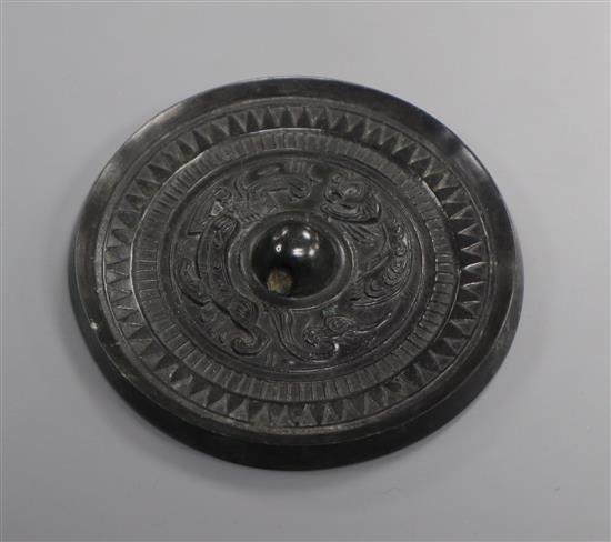 A Chinese hardstone mirror, probably Han ex John Hilliard collection dynasty